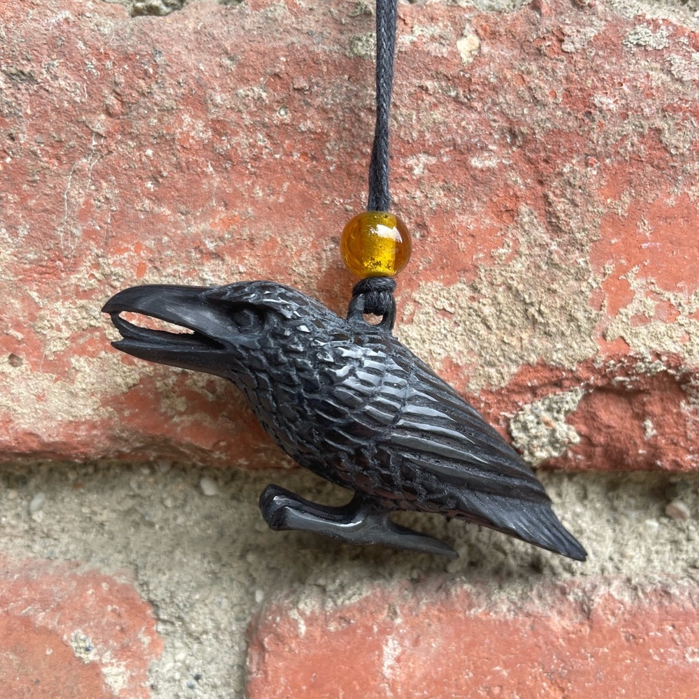 Carved raven necklace